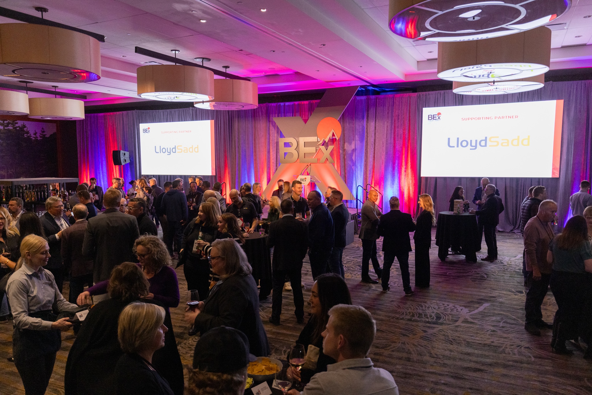 BEx welcome reception with attendees mingling in the ballroom